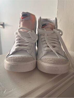 Nike Women’s White High-Top Sneakers with Pink Tongue and Red Swoosh